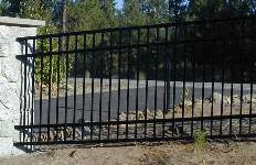 Black Quad Rails Give This Fence Extra Strength And Beauty